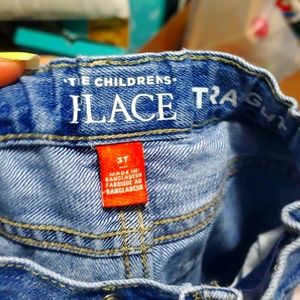 Children place jeans